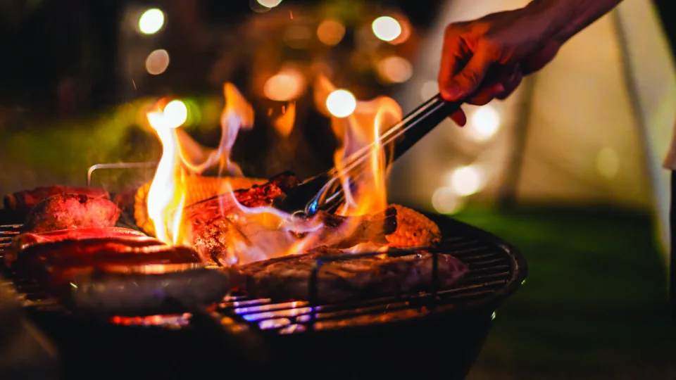 Family,Making,Barbecue,In,Dinner,Party,Camping,At,Night