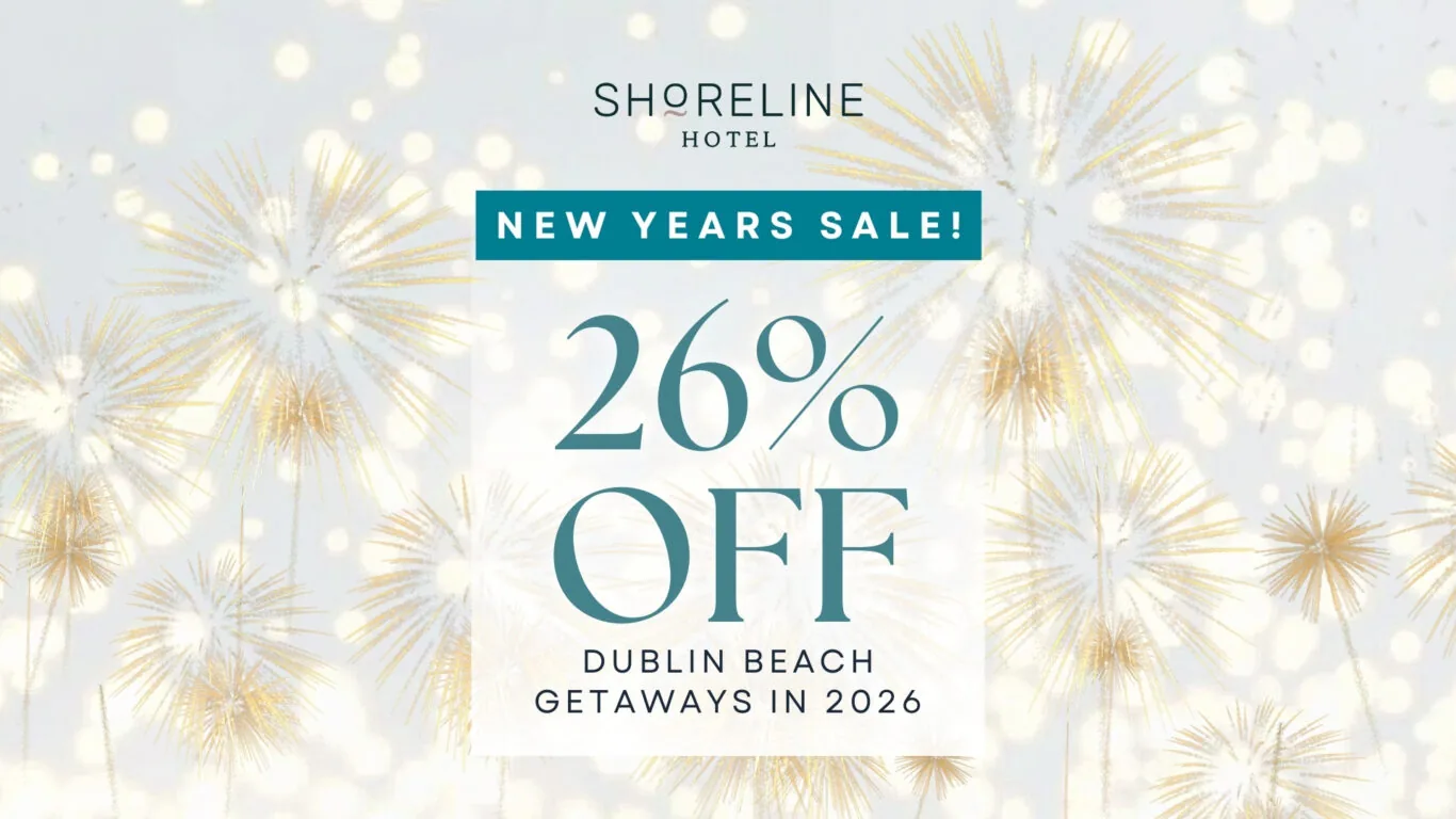 Shoreline Hotel New Years Sale banner offering 26% off Dublin Beach getaways in 2026, with fireworks in the background.