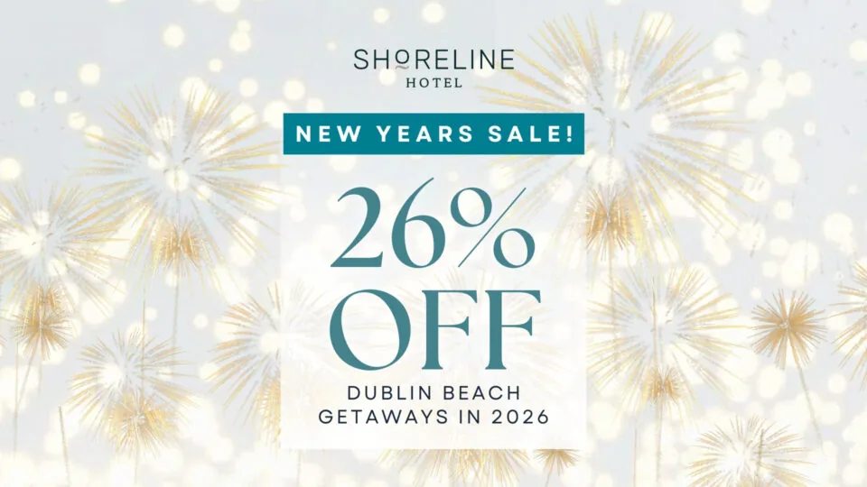 Shoreline Hotel New Years Sale banner offering 26% off Dublin Beach getaways in 2026, with fireworks in the background.